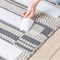 Le double tissu de coton dégrossi sans résidu de bande de couture de tapis a adapté toutes les surfaces de plancher