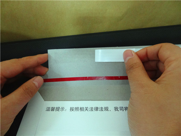 Bande à couche double de tissu pour le cachetage de documents